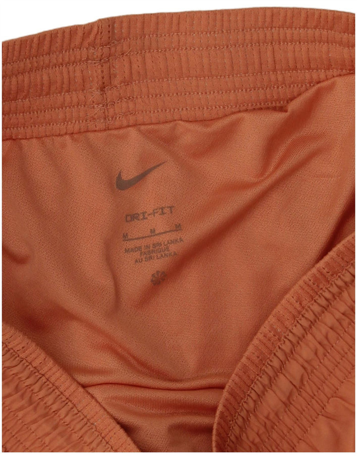 Nike - Pantalones cortos deportivos Dri Fit para mujer, talla 40, poliéster, color naranja medio