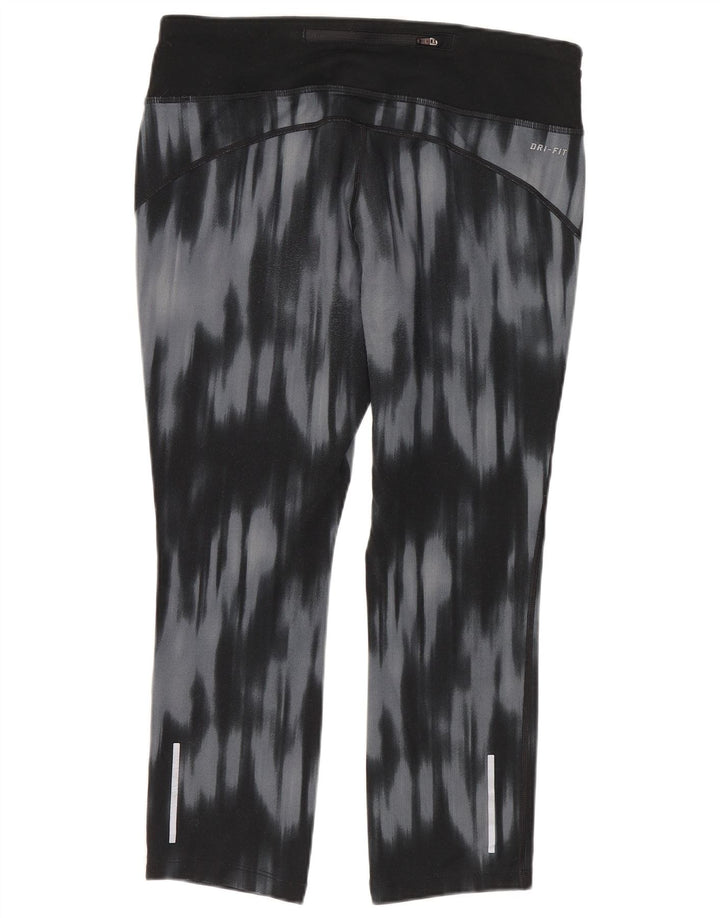 Nike - Leggings capri Dri Fit para mujer, talla 40, poliéster teñido anudado, color azul medio