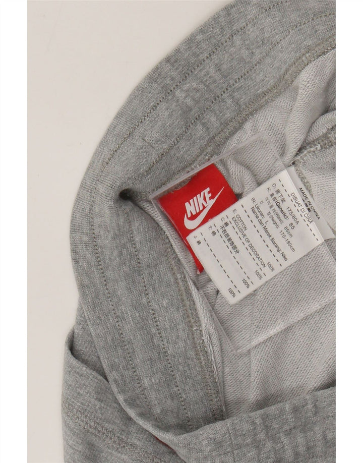 Nike - Pantalón de chándal para niño, 13-14 años, talla grande, algodón gris