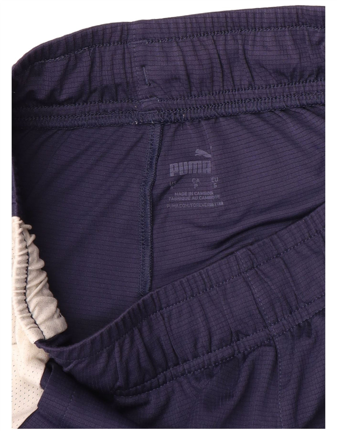 Puma Pantalones cortos deportivos con gráficos para hombre, talla pequeña, color azul marino