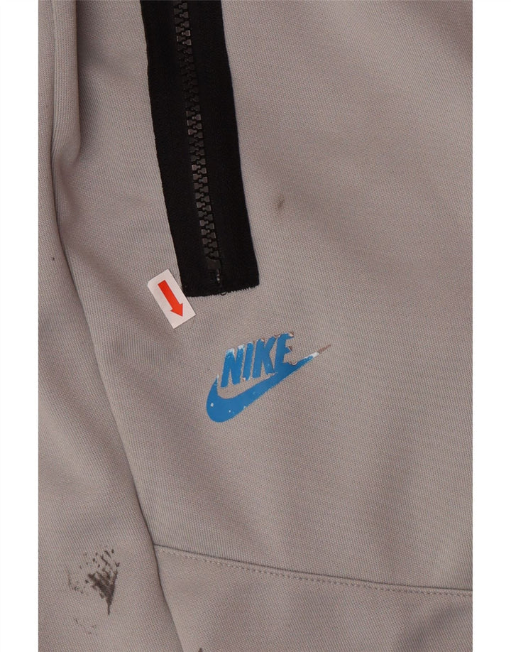 NIKE Hombre Pantalones de Chándal Joggers Gris Medio Poliéster