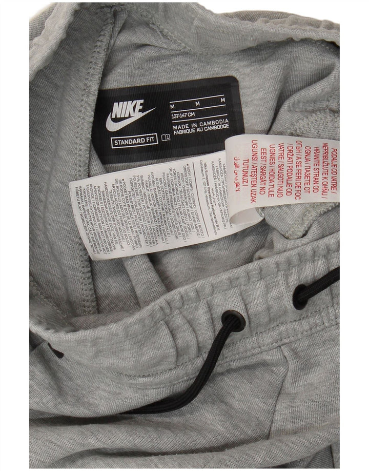 Nike - Pantalones de chándal para niño, 10-11 años, color gris medio jaspeado