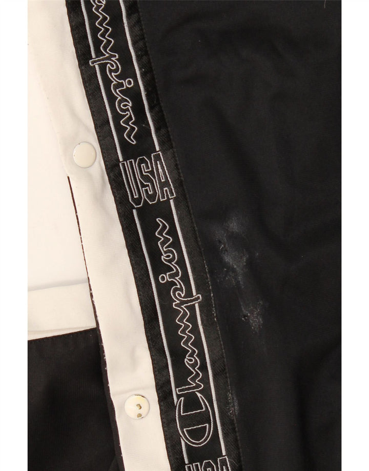 Champion Pantalones De Chándal Estampados En Negro Mediano Colorblock