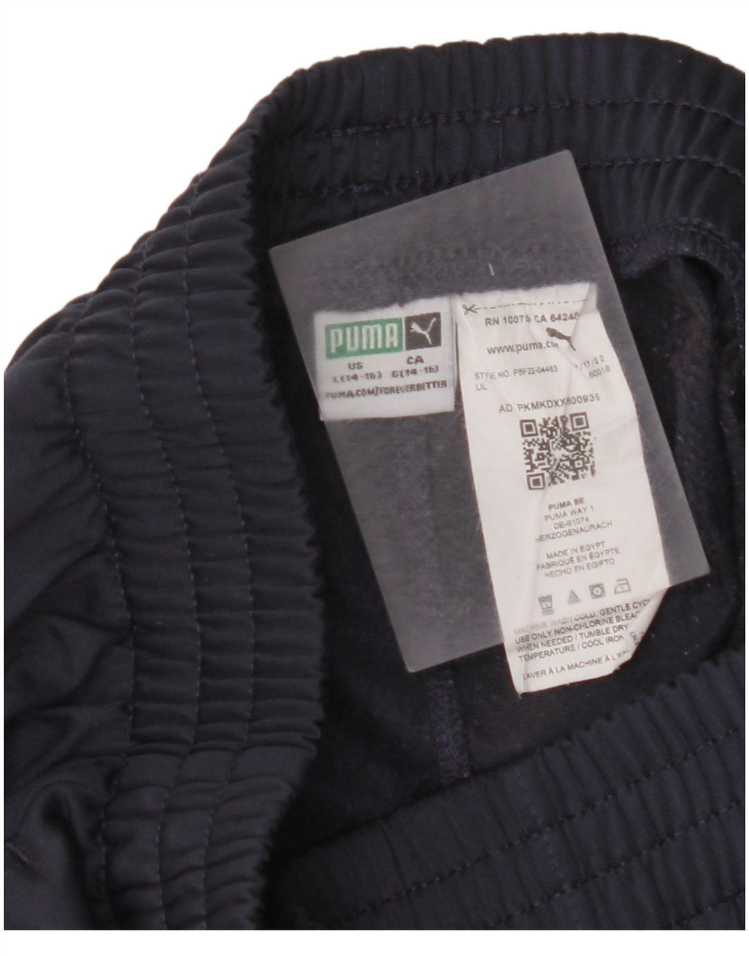 PUMA Pantalones de chándal con estampado gráfico para niños, 13-14 años, grande, azul marino