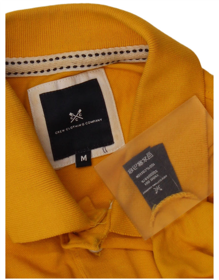 Crew Clothing Polo para hombre de algodón amarillo medio