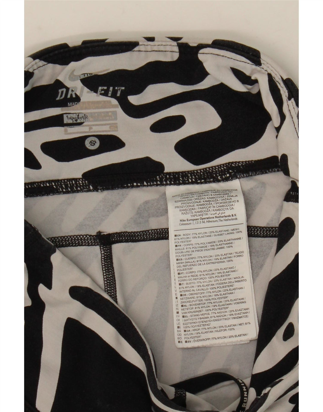 NIKE Leggings Dri Fit con patrón abstracto para mujer, talla 8, nailon negro pequeño