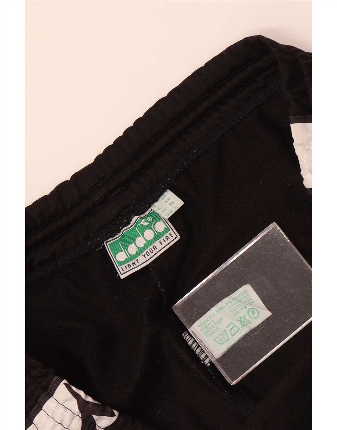 Diadora Hombre Pantalones De Chándal Con Gráfico Grande Negro Poliéster Color Block