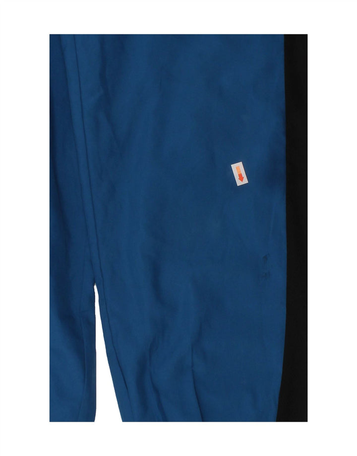 NIKE Boys Dri Fit Tracksuit Trousers Joggers 10-11 Years Medium Blue Vintage Nike and Second-Hand Nike from Messina Hembry 