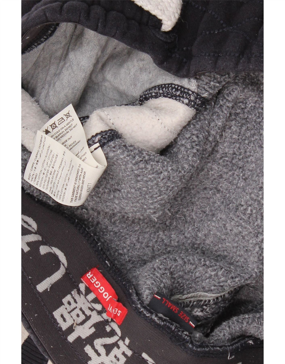 SUPERDRY Hombre Pantalones de chándal con estampado gráfico Small Azul marino Colorblock