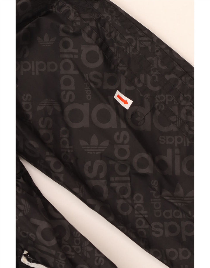 ADIDAS Chaqueta impermeable con capucha gráfica para hombre UK 38 Mediana Poliamida negra