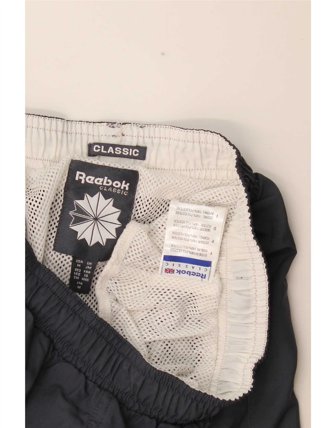Reebok Pantalones cortos deportivos clásicos con gráficos para niños 9-10 años Gris Poliéster
