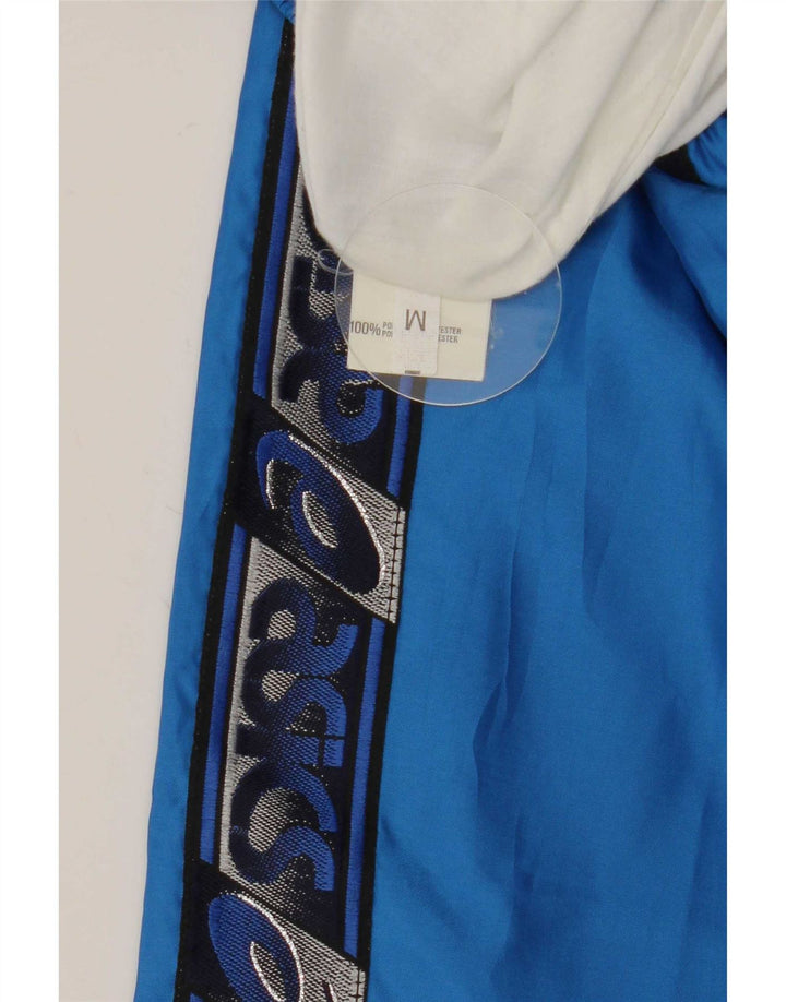 Asics Hombre Pantalones De Chándal Gráfico Poliéster Colorblock Azul Medio