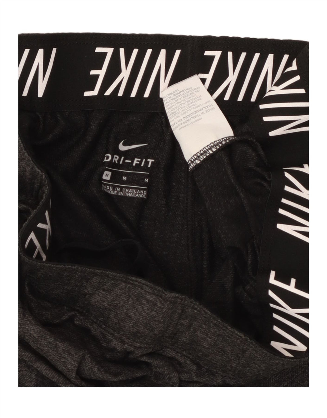 Nike - Pantalones cortos deportivos Dri Fit para mujer, talla 40, poliéster gris medio