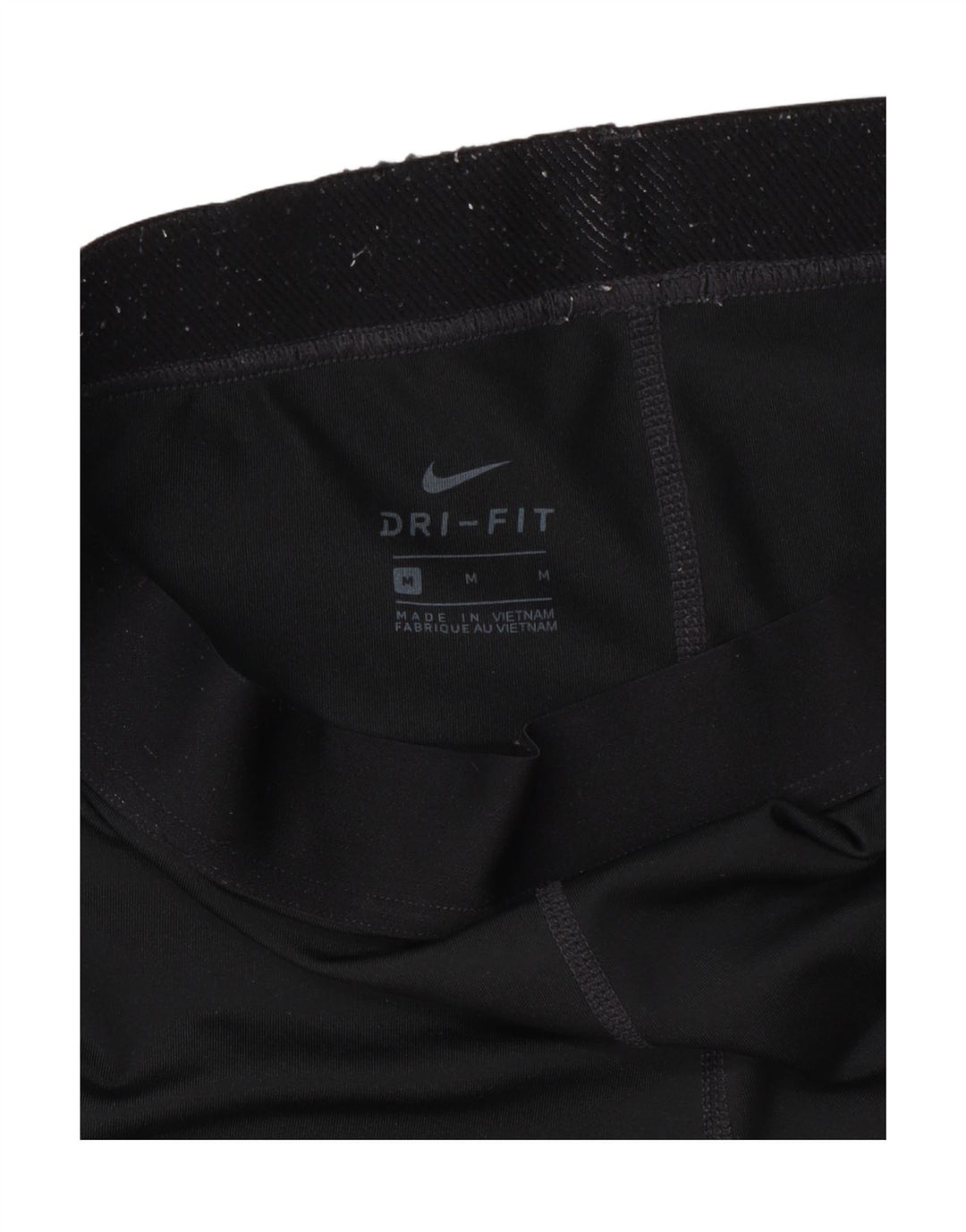 Nike - Leggings capri Dri Fit para mujer, talla M, color negro
