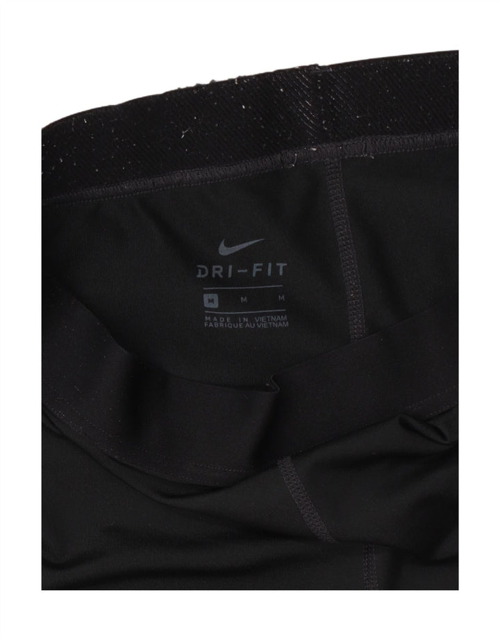 Nike - Leggings capri Dri Fit para mujer, talla M, color negro