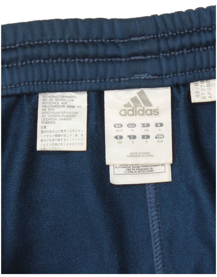 Adidas - Pantalón de chándal para hombre, talla 40/42, color azul medio, poliéster