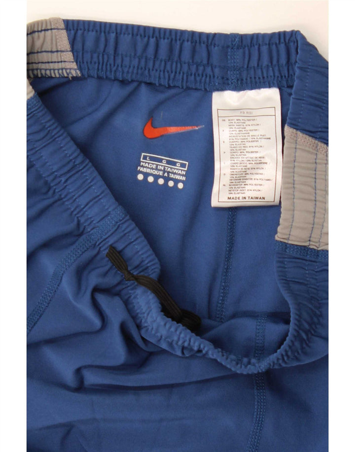 Nike - Pantalones de chándal para mujer (talla 40), color azul, poliéster