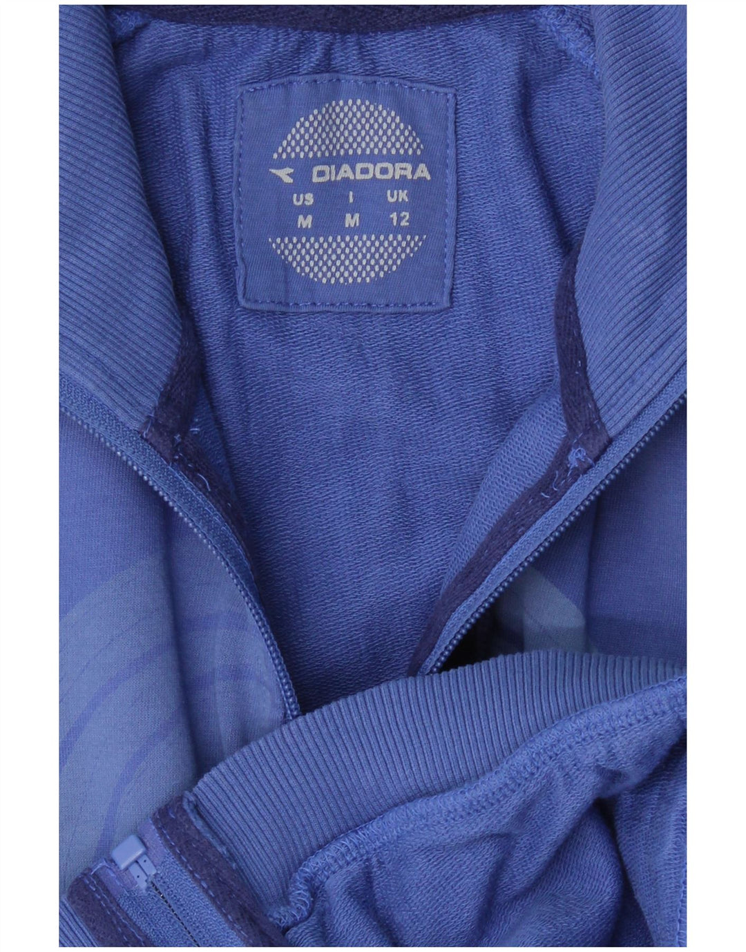 DIADORA Chaqueta superior de chándal con gráfico para mujer UK 40 Azul medio