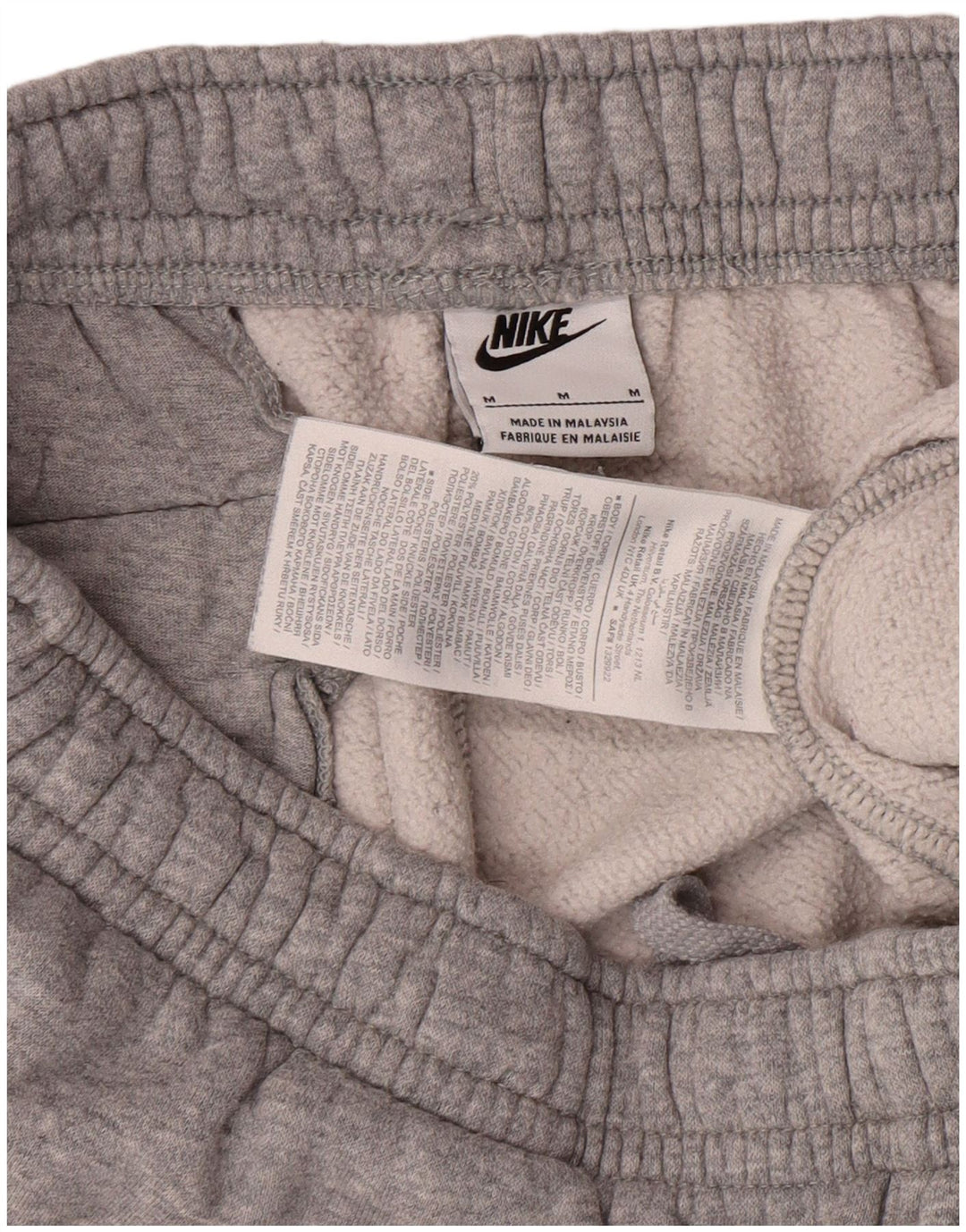 NIKE Hombre Pantalones de Chándal Joggers Gris Medio Algodón