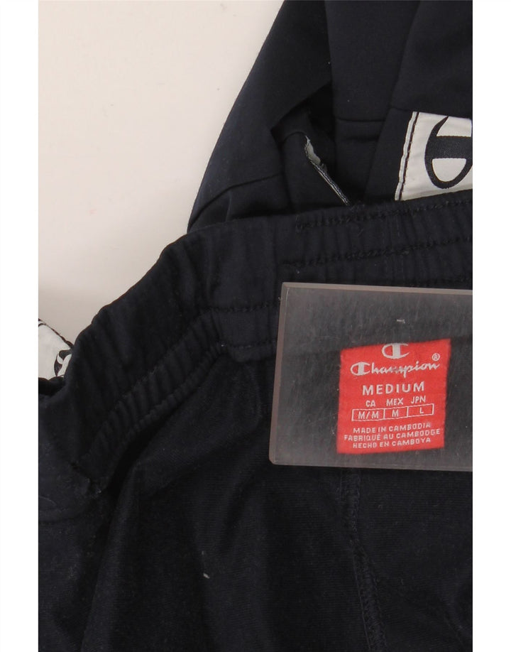 Champion Pantalones De Chándal Gráficos En Azul Marino Medio Colorblock
