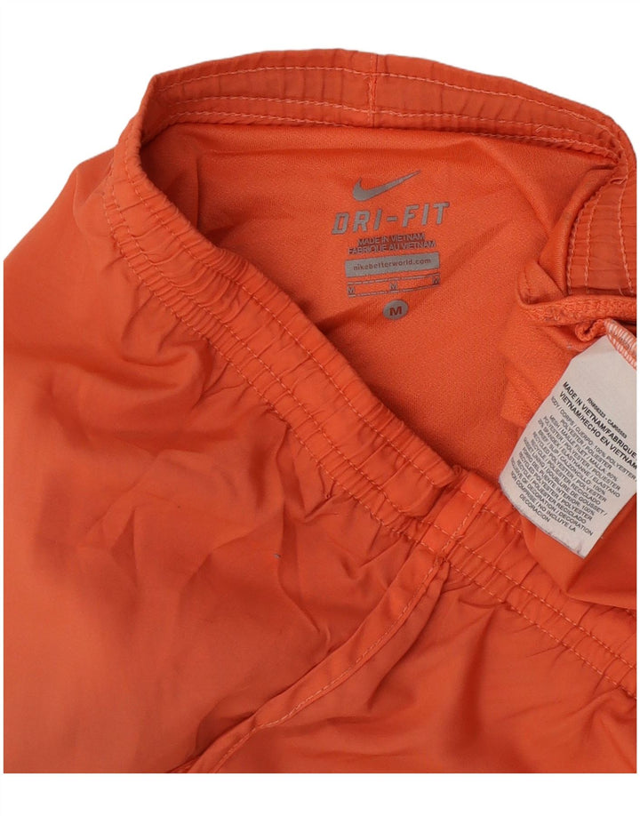 Nike - Pantalones cortos deportivos Dri Fit para mujer, talla 40, poliéster, color naranja medio