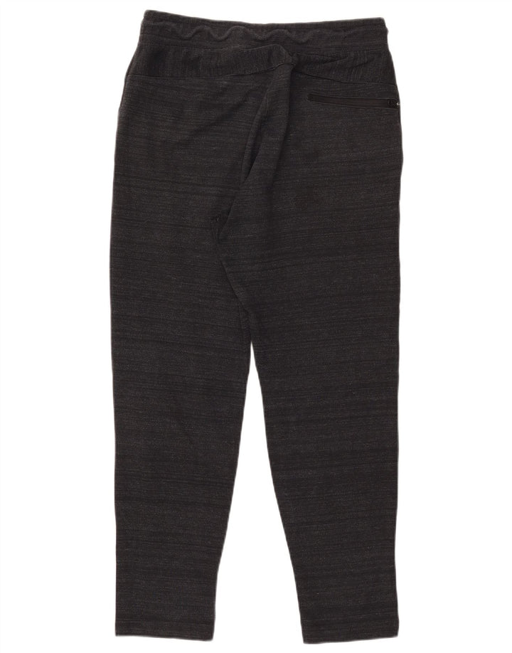 Pantalones de chándal NIKE de algodón moteado en negro mediano para hombre
