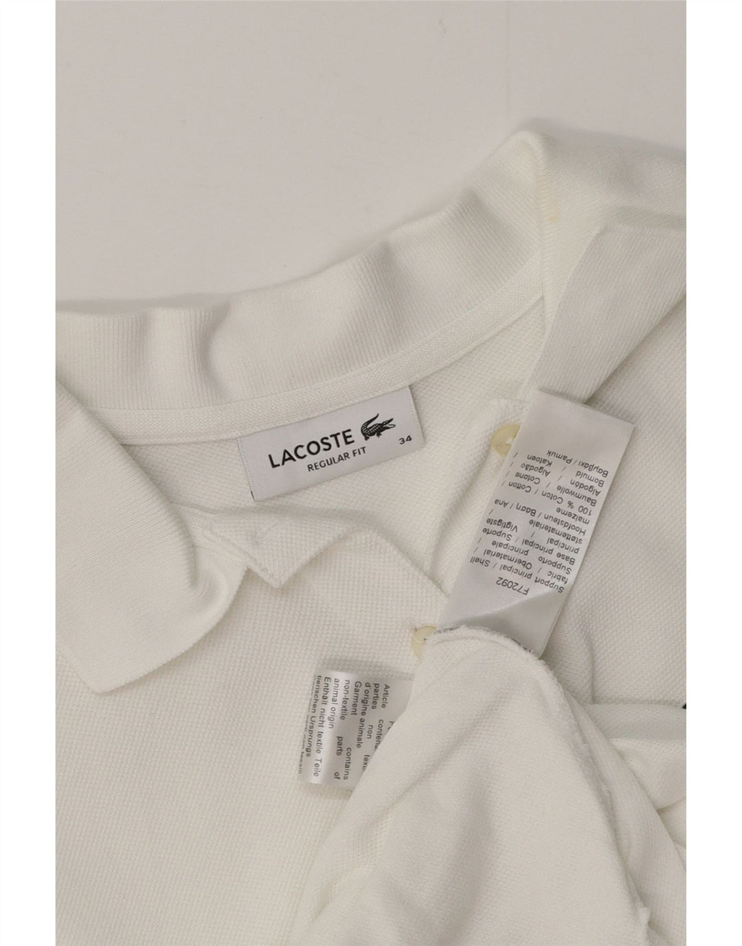 LACOSTE Polo de corte regular para mujer Talla 34 Pequeño Algodón blanco