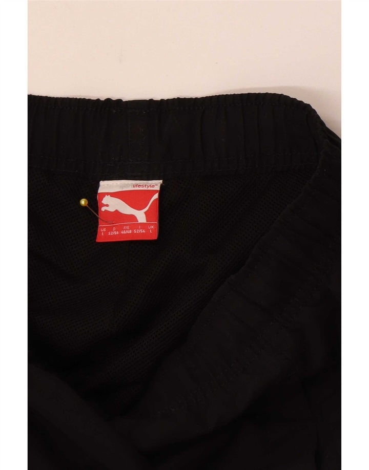 Puma Pantalones cortos deportivos con gráficos para hombre, talla grande, negro