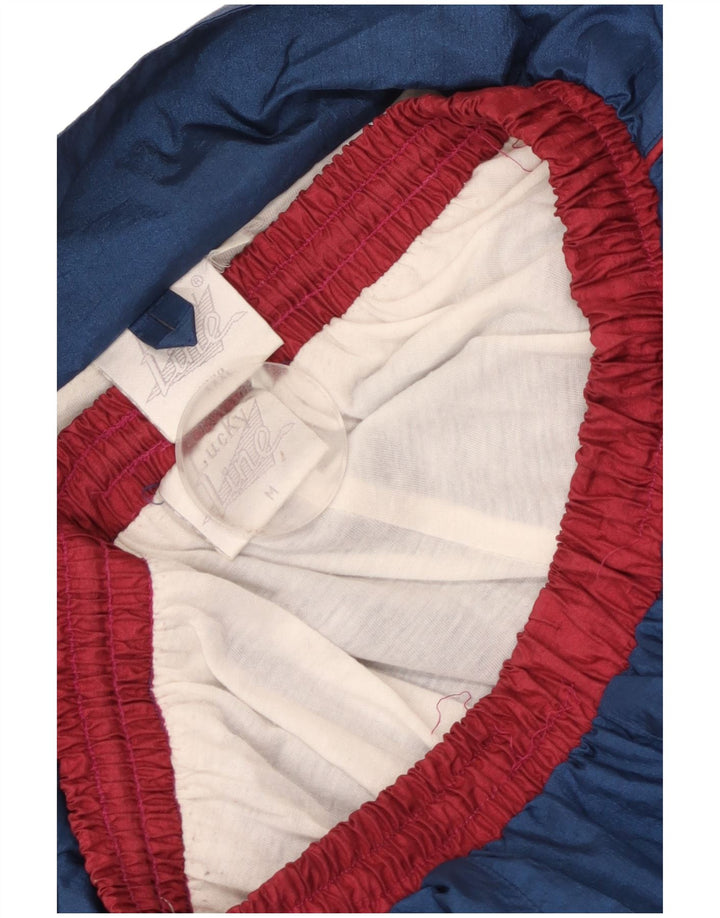 Chándal completo de gran tamaño vintage para hombre Bloque de color azul marino medio