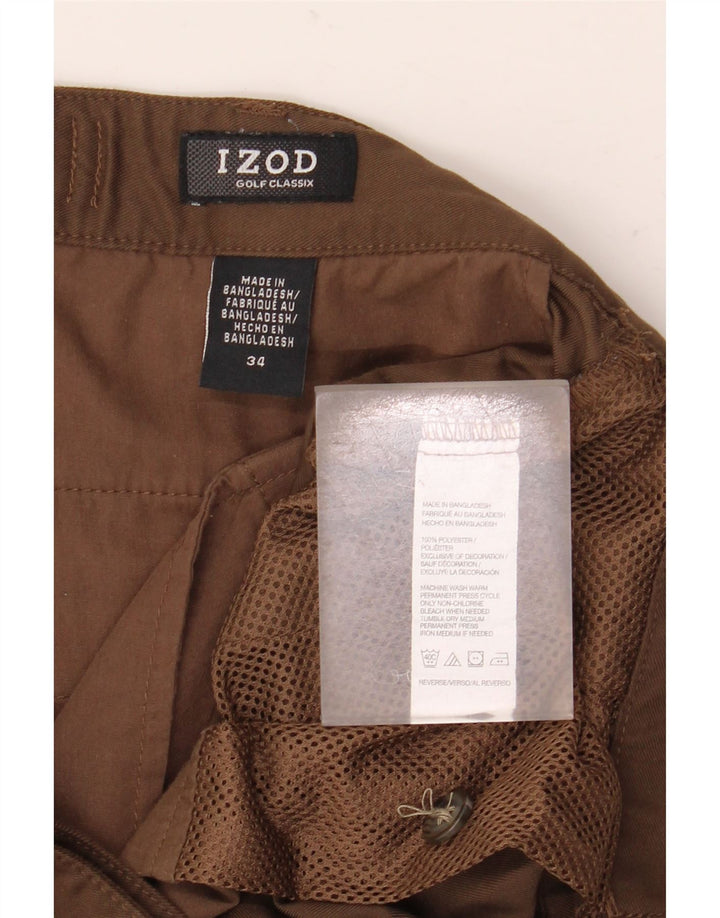 IZOD Pantalones cortos chinos pegados para hombre W34 Poliéster marrón grande