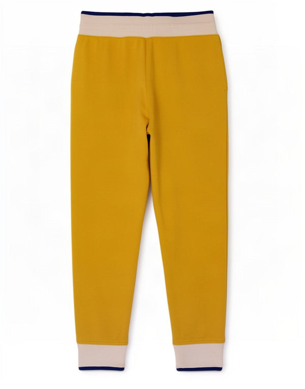 Nike - Pantalones de chándal para mujer, talla 40, color amarillo medio