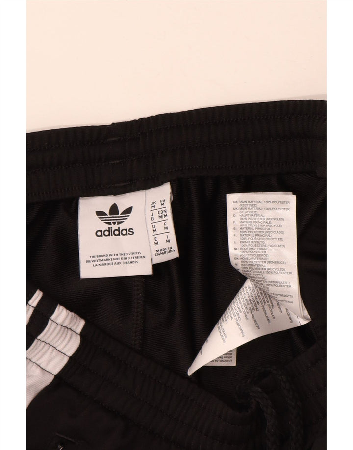 ADIDAS Pantalón de chándal gráfico para hombre Poliéster con bloques de color negro mediano