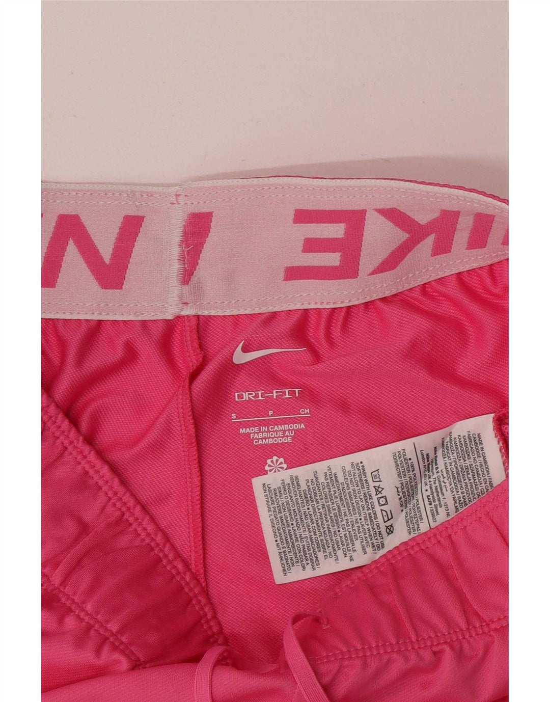 Nike - Pantalones cortos deportivos Dri Fit para mujer, talla 10, poliéster rosa pequeño