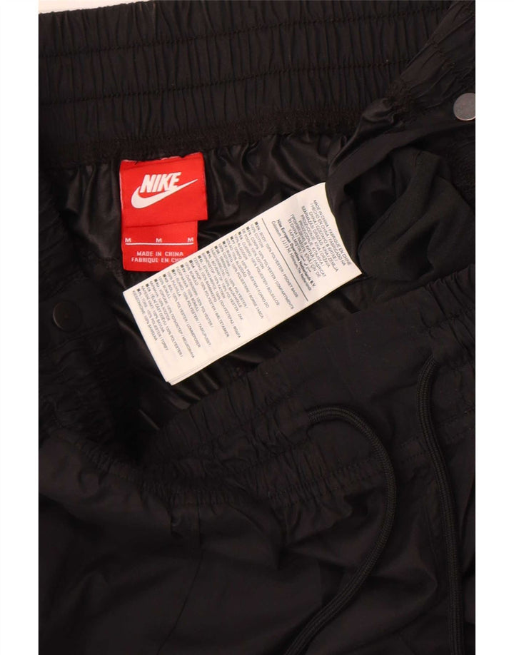Nike - Pantalones impermeables para mujer, talla 40, talla M, color negro, poliéster