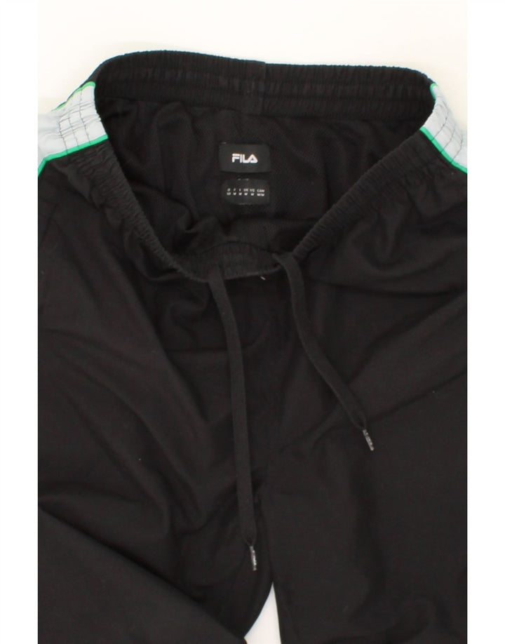 FILA Mens Graphic Tracksuit Trousers Medium Black Colourblock Polyester Vintage Fila and Second-Hand Fila from Messina Hembry 