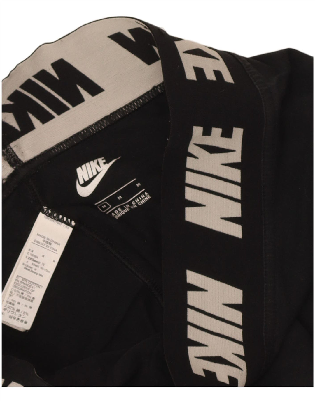 Nike - Leggings gráficos para mujer (talla 40), algodón negro mediano