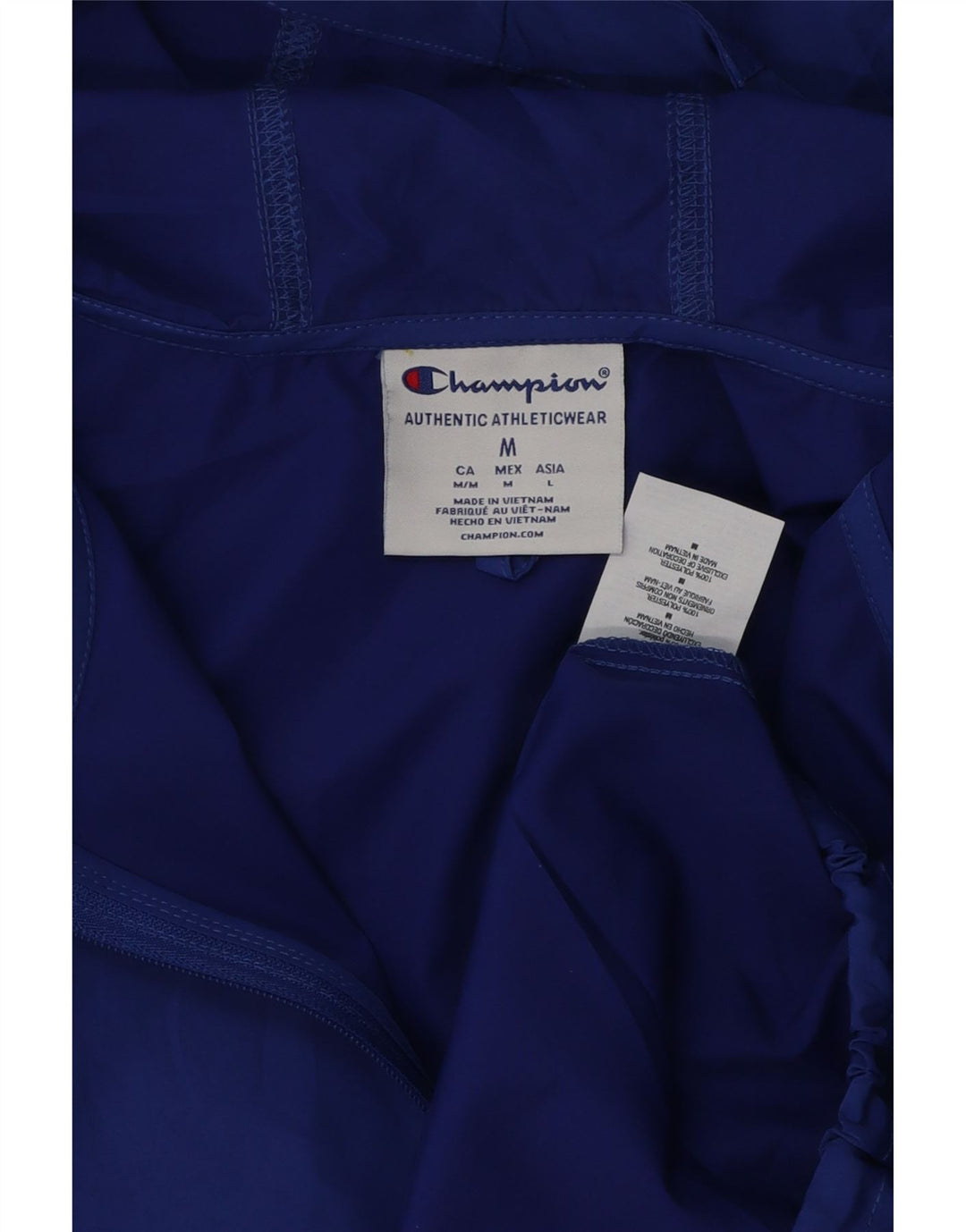 Champion Chaqueta impermeable con capucha gráfica para hombre UK 38 Poliéster azul medio