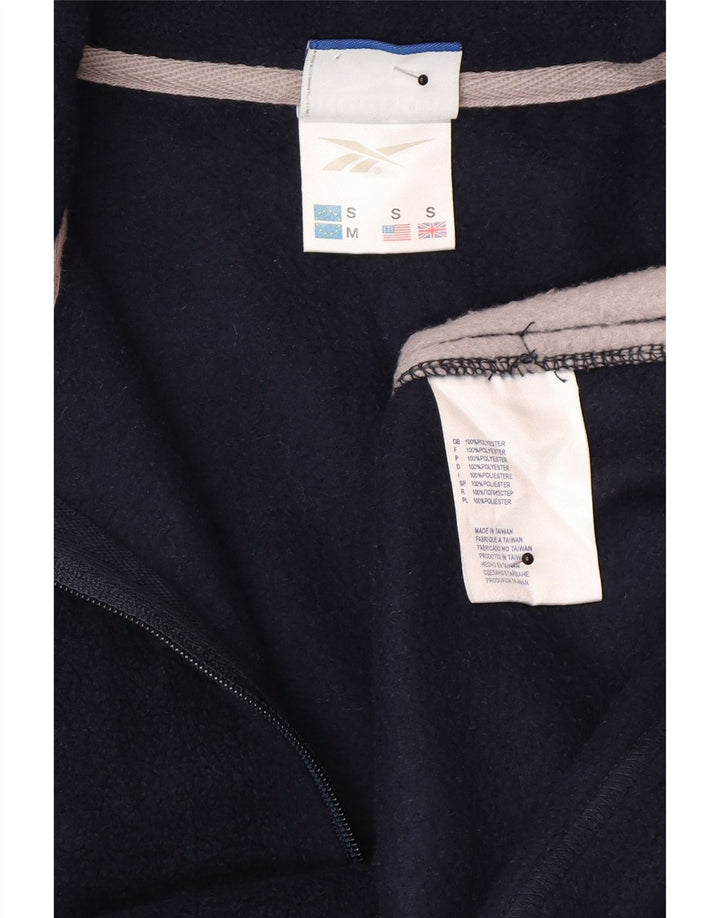 Reebok - Jersey de forro polar con cremallera y cuello para hombre, tamaño pequeño, poliéster color block azul marino