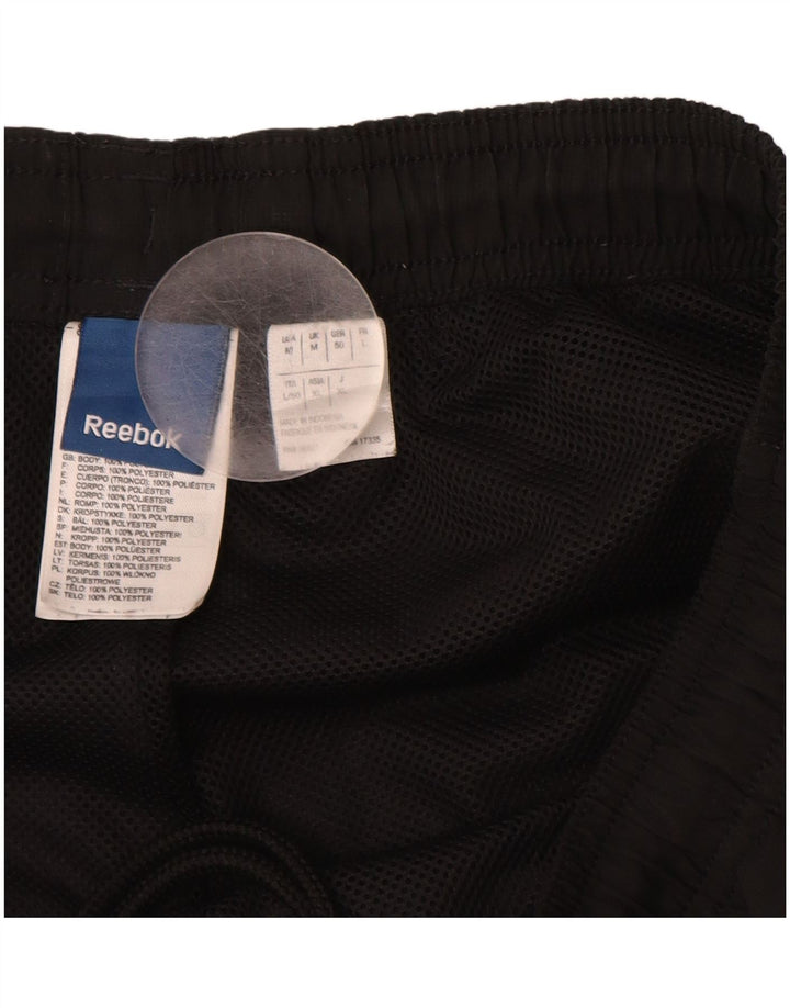 Pantalón de Chándal REEBOK Hombre Mediano Negro Poliéster