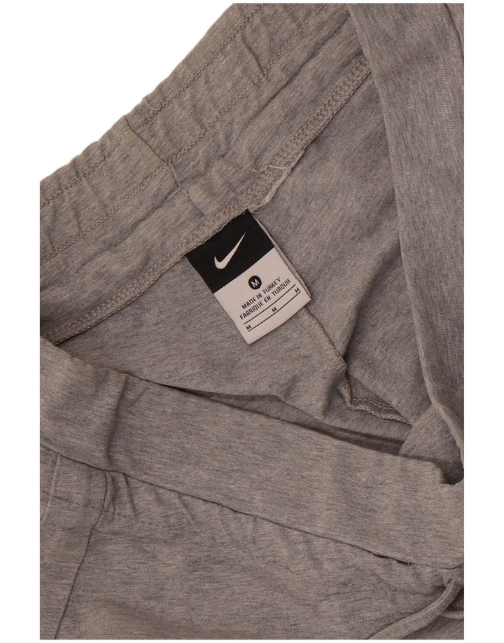 Nike - Pantalones cortos deportivos para mujer (talla 40), color gris medio