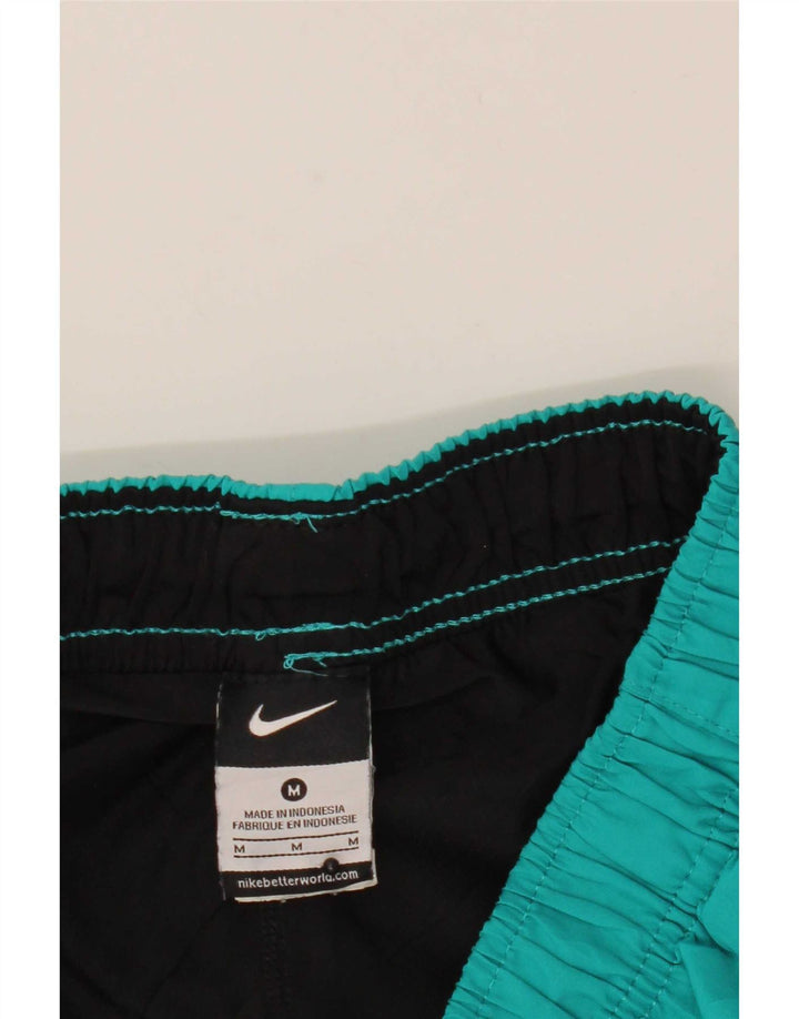 Pantalón corto deportivo Nike Hombre Poliéster turquesa medio