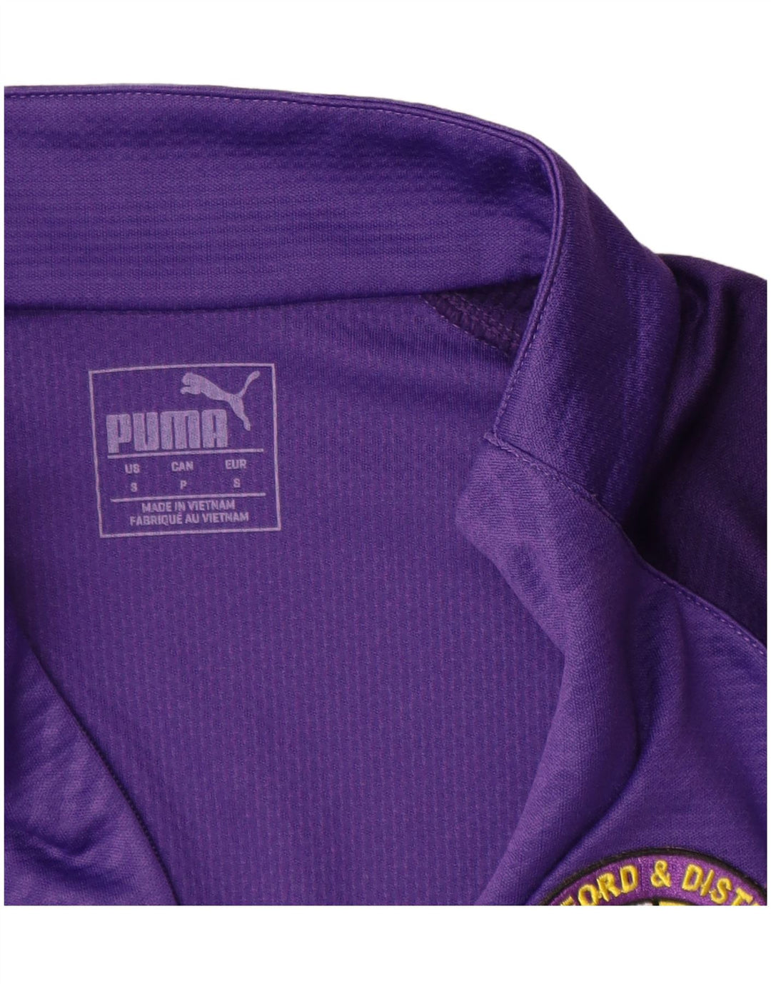 PUMA Top de chándal con cuello con cremallera y gráfico para hombre, pequeño, morado, geométrico