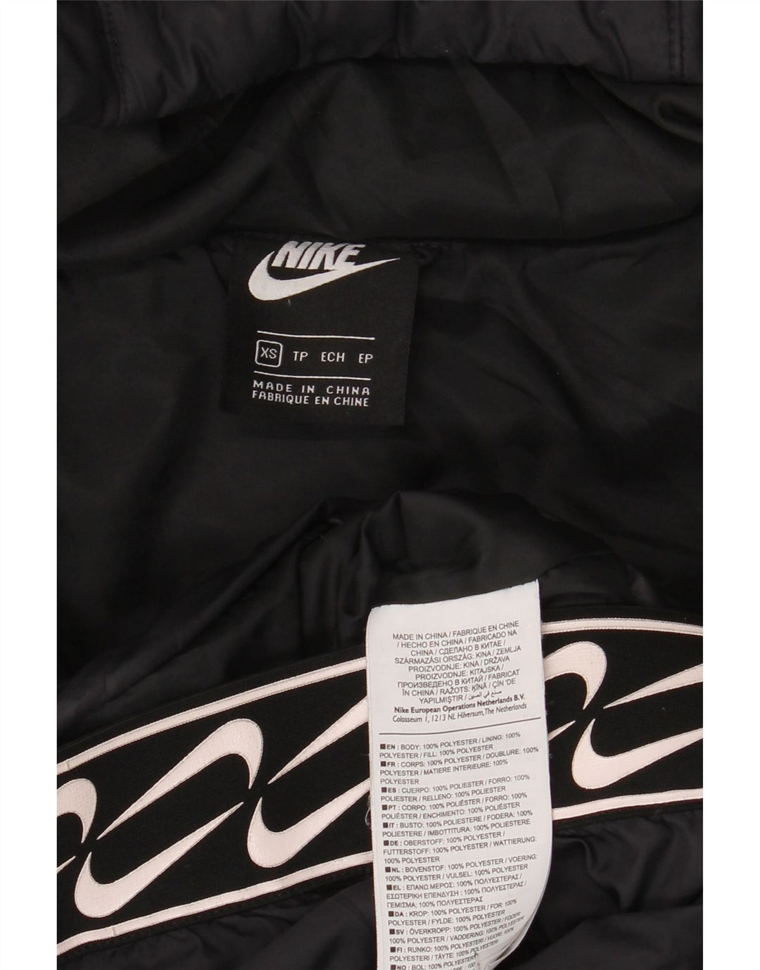 Nike Chaqueta acolchada con capucha gráfica para mujer UK 6 XS Poliéster negro