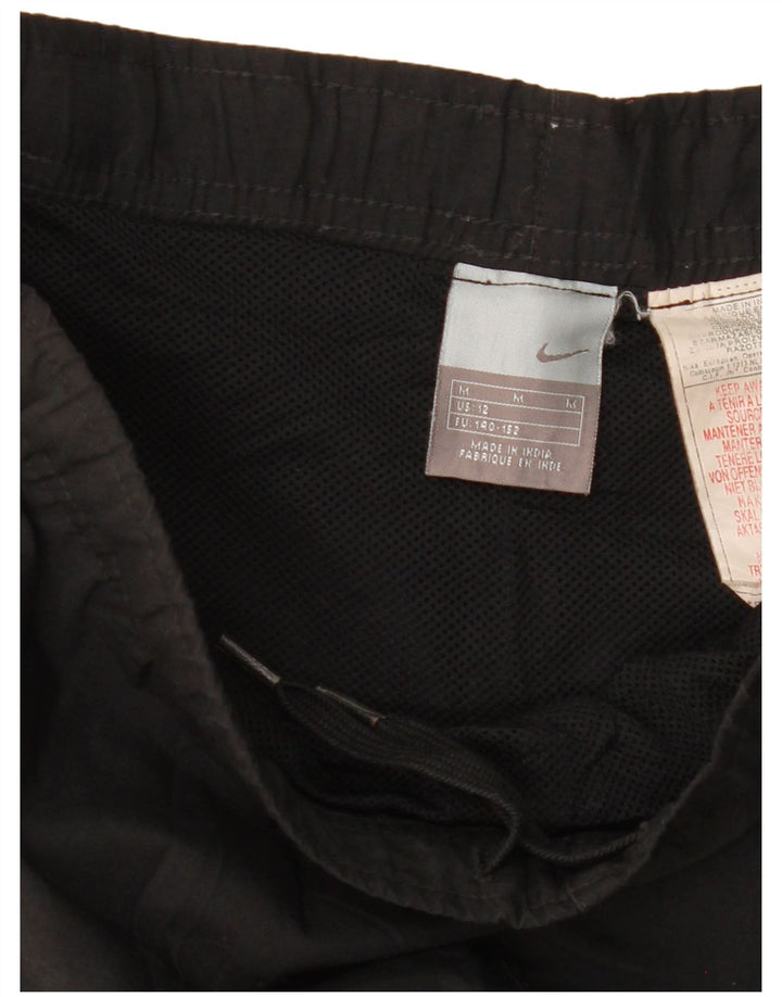 Nike Pantalones de chándal para niño 11-12 años Mediano Negro Colorblock Poliéster