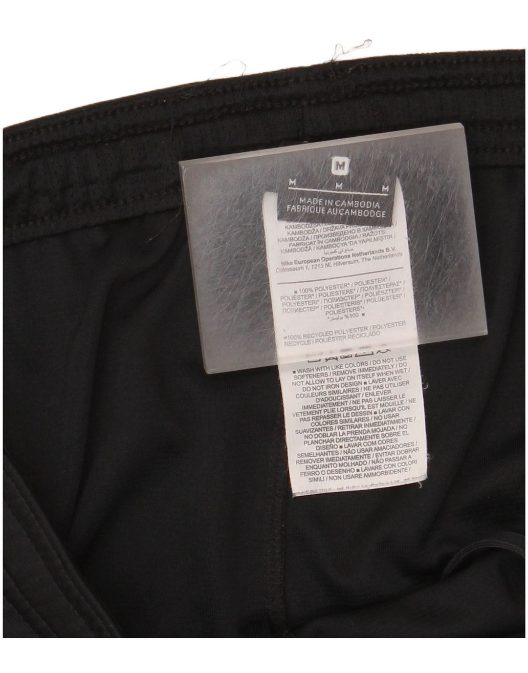 Pantalón corto deportivo Nike para hombre Poliéster color block en negro mediano
