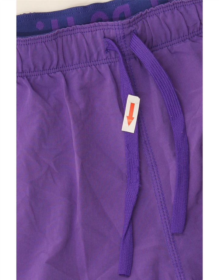 Nike - Pantalones cortos deportivos Dri Fit para mujer, talla 40, poliéster morado mediano