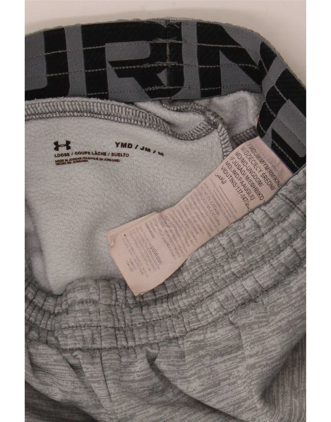 Under Armour Pantalones de chándal con estampado gráfico para niños 9-10 años Gris medio