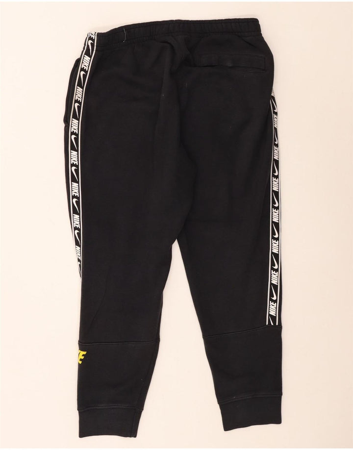 Nike Pantalones De Chándal Con Gráficos Joggers De Algodón Negro Mediano