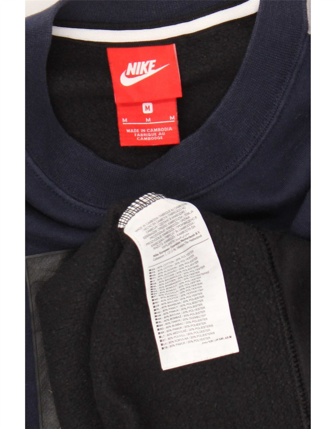 Nike Hombre Sudadera con gráfico tipo jersey de algodón color block en azul marino mediano
