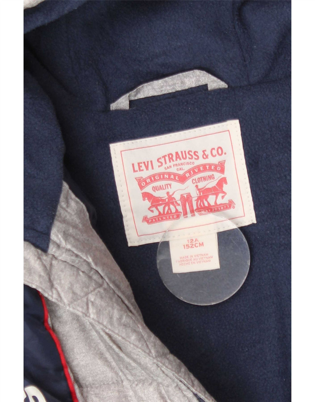 Levi's Chaqueta acolchada con capucha y estampado gráfico para niños 11-12 años Bloque de color gris
